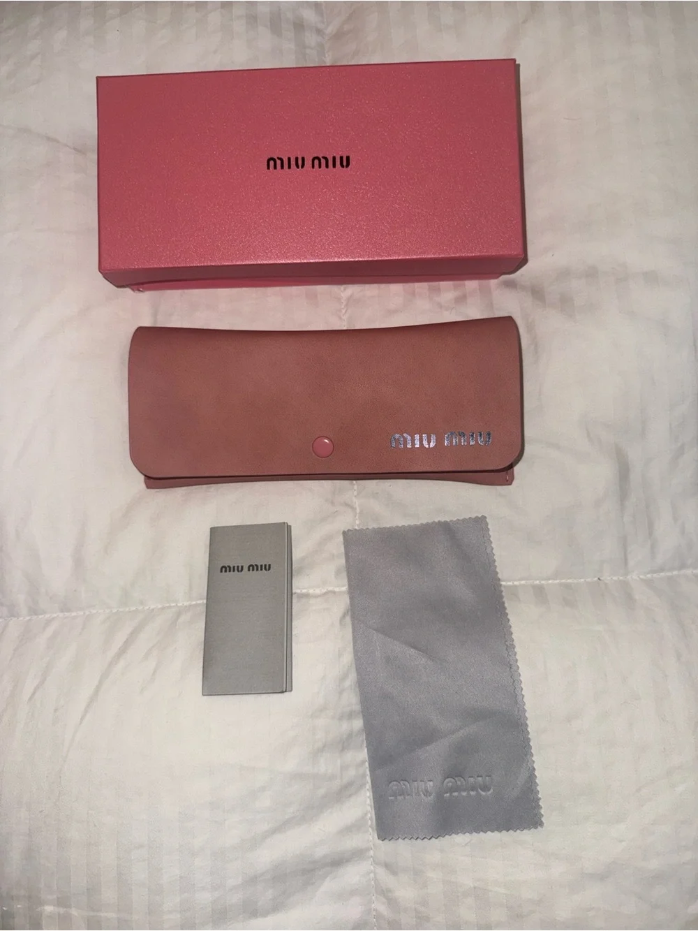 Miu Miu Black Oval Sunglasses with Pink Branded Case and Box